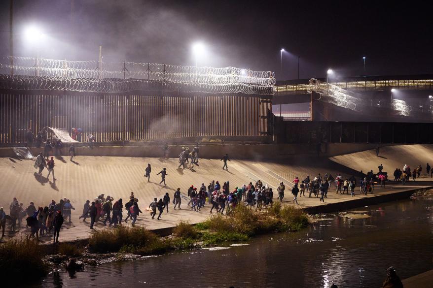 Migrants spent a day waiting at the U.S.-Mexico border before the entry gate opened.