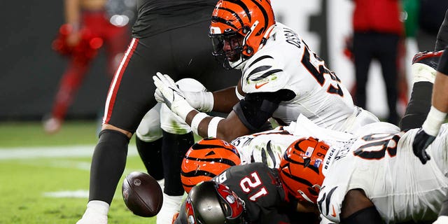 Tom Brady #12 of the Tampa Bay Buccaneers is sacked and fumbles the ball during the third quarter in the game against the Cincinnati Bengals at Raymond James Stadium on December 18, 2022 in Tampa, Florida.