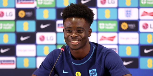 Bukayo Saka of England speaks during the England Press Conference on the day after the Round of 16 match against Senegal at Al Wakrah Stadium on December 05, 2022 in Doha, Qatar.