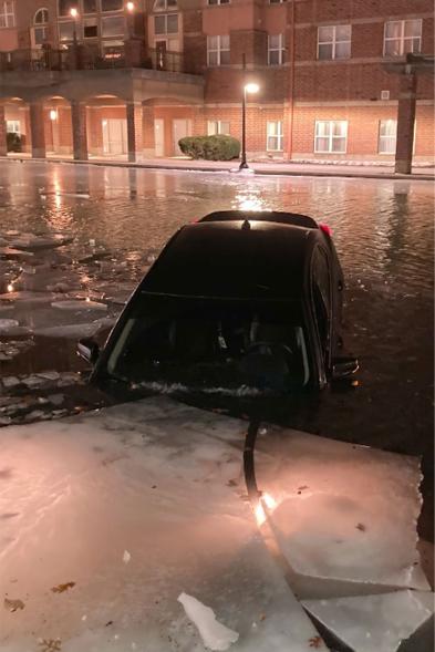 Car submerged in canal