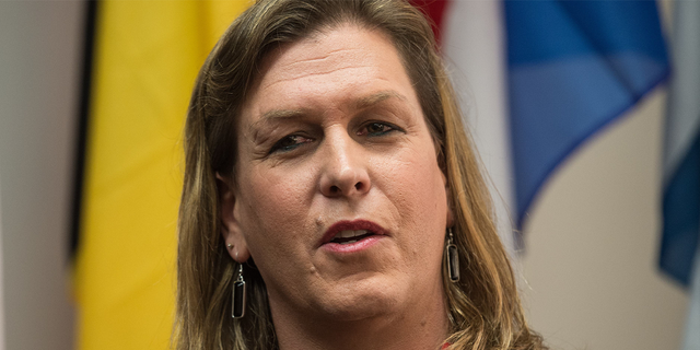 Transgender former US Navy Seal Senior Chief Kristin Beck speaks during a conference entitled "Perspectives on Transgender Military Service from Around the Globe" organized by the American Civil Liberties Union (ACLU) and the Palm Center in Washington on October 20, 2014. Transgender military personnel from 18 countries who allow them to serve openly, gathered to talk about their experiences and discuss whether the US military could join them. AFP PHOTO/Nicholas KAMM (Photo credit should read NICHOLAS KAMM/AFP via Getty Images)