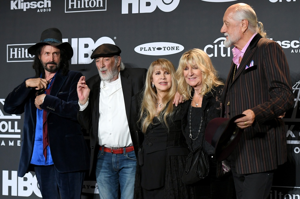 Mike Campbell, John McVie, inductee Stevie Nicks, Christine McVie and Mick Fleetwood of Fleetwood Mac appear at the group's induction into the Rock & Roll Hall of Fame in 2019.