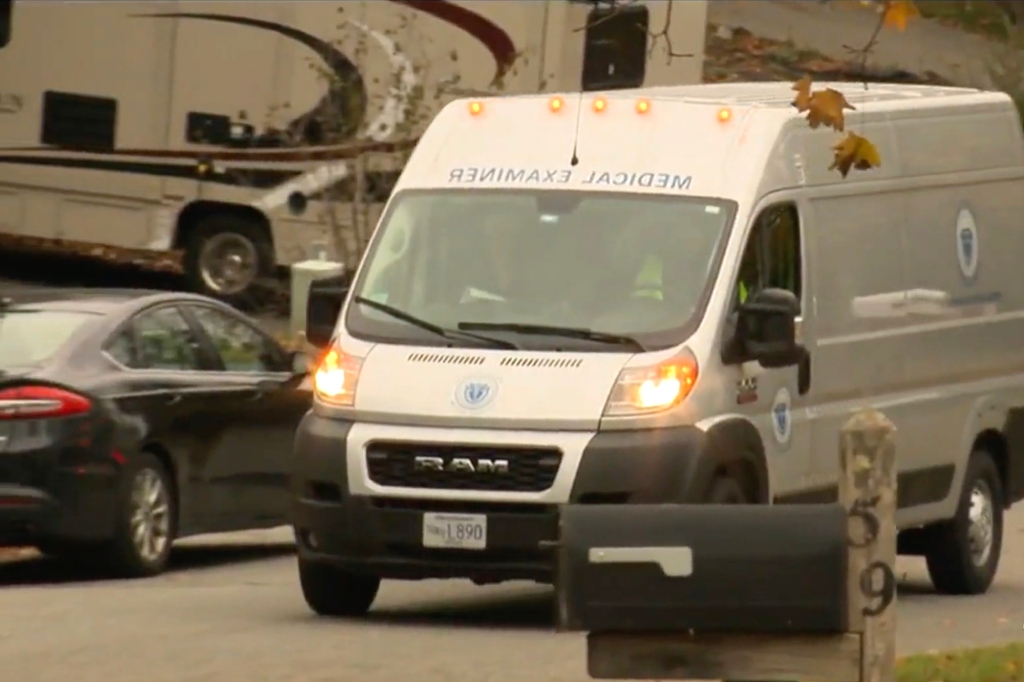 An ambulance drives to the scene.