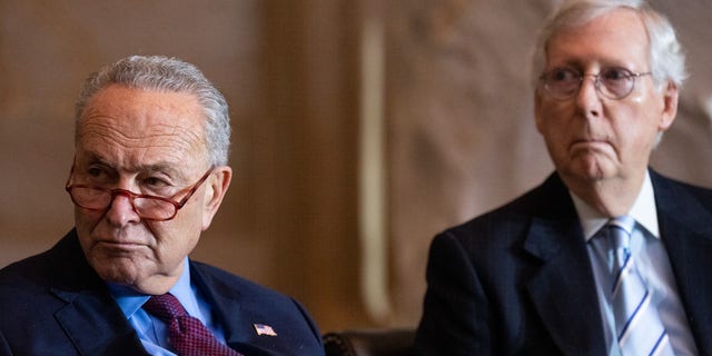 UNITED STATES - DECEMBER 6: From left, Senate Majority Leader Chuck Schumer, D-N.Y., and Senate Minority Leader Mitch McConnell, R-Ky., attend the Congressional Gold Medal Ceremony in the Capitol Rotunda on Tuesday, December 6, 2022. The medals were awarded in recognition of those who protected the United States Capitol on January 6, 2021.