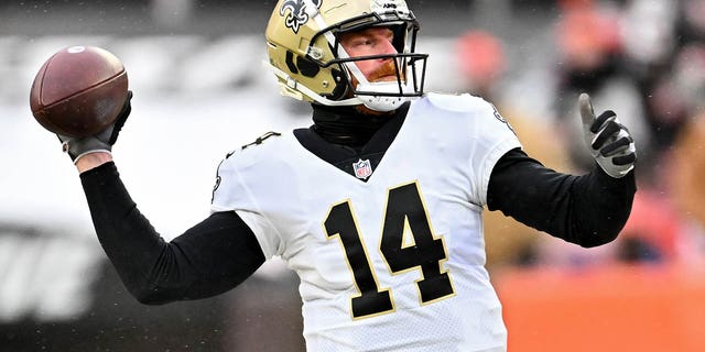 Andy Dalton #14 of the New Orleans Saints throws a pass during the second half in the game against the Cleveland Browns at FirstEnergy Stadium on December 24, 2022 in Cleveland, Ohio. 