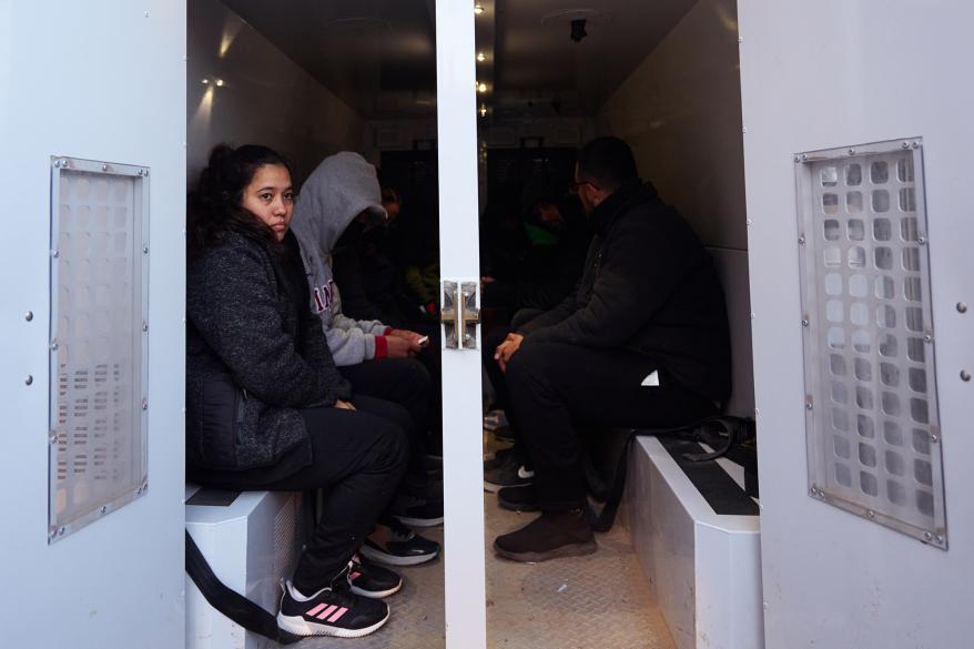 Migrants being housed in a stash house are taken into custody by members of the U.S. Customs and Border Protection on Wednesday, December 21, 2022 in El Paso, Texas.