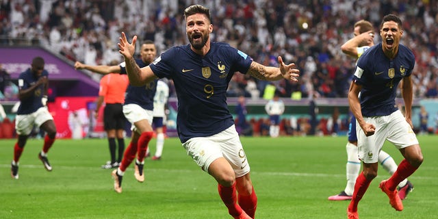 AL KHOR, QATAR - DECEMBER 10: Olivier Giroud of France celebrates scoring a goal to make it 1-2 during the FIFA World Cup Qatar 2022 quarter final match between England and France at Al Bayt Stadium on December 10, 2022 in Al Khor, Qatar.