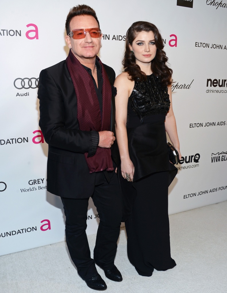 Eve Hewson with her dad, Bono, dressed up for an event. 