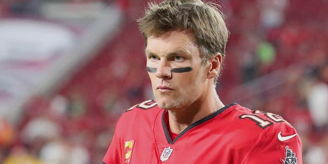 Buccaneers' Tom Brady looks toward the sidelines before the start of the New Orleans Saints game on Dec. 5, 2022, at Raymond James Stadium in Tampa, Florida.