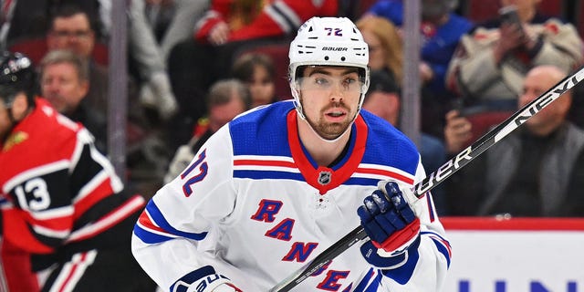 Filip Chytil #72 of the New York Rangers skates against the Chicago Blackhawks on December 18, 2022, at United Center in Chicago, Illinois. New York defeated Chicago 7-1. 