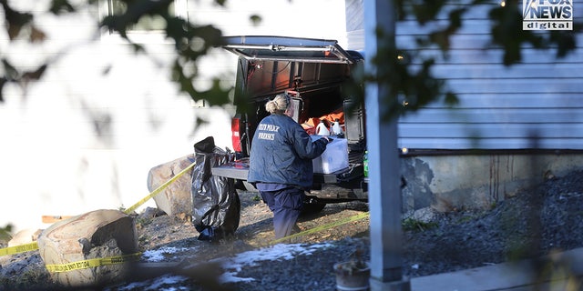 State police forensics look for clues in Moscow, Idaho on Monday, November 21, 2022. Four University of Idaho students who were slain on November 13 in this house.