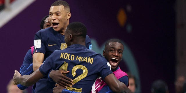 Randal Kolo Muani of France celebrates with teammates after scoring the team's second goal during the FIFA World Cup Qatar 2022 semi final match between France and Morocco at Al Bayt Stadium on December 14, 2022 in Al Khor, Qatar. 