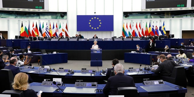 European Commission President Ursula von der Leyen delivers a speech during a plenary session at the European Parliament in Strasbourg, eastern France, Wednesday, Dec. 15, 2021. European Commission President Ursula von der Leyen says that omicron is expected to be the dominant coronavirus variant in the 27-nation bloc by mid-January. 