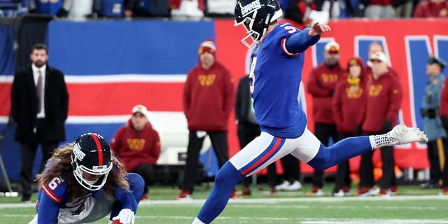 Graham Gano of the New York Giants misses a field goal in overtime against the Washington Commanders at MetLife Stadium on Dec. 4, 2022, in East Rutherford, New Jersey. The game ended in a 20-20 tie.