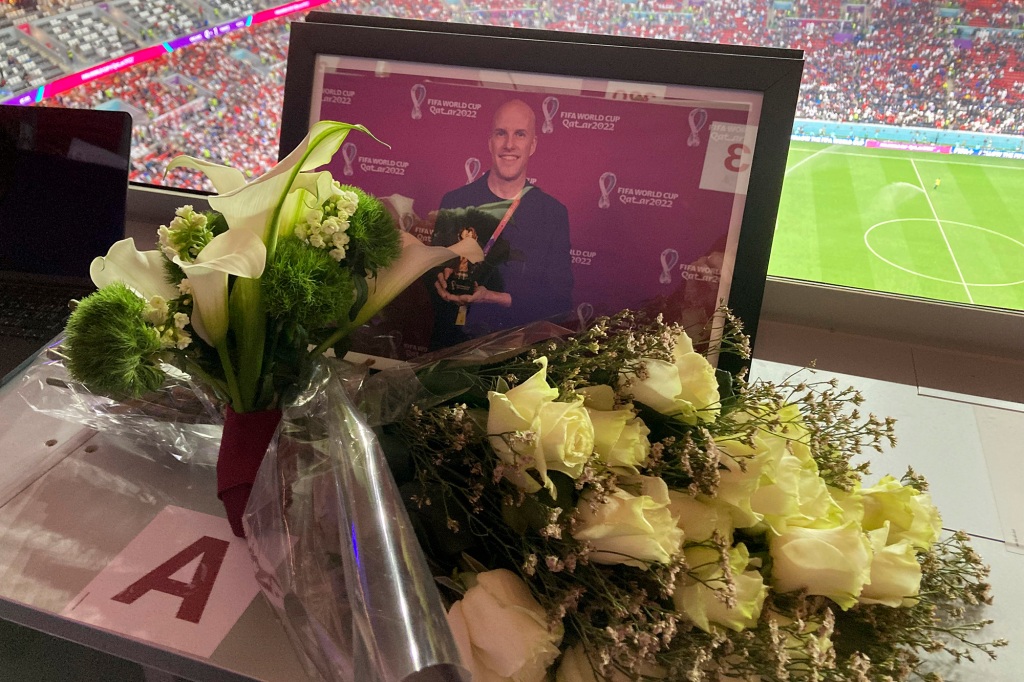A tribute to journalist Grant Wahl is seen on his previously assigned seat at the World Cup quarterfinal.