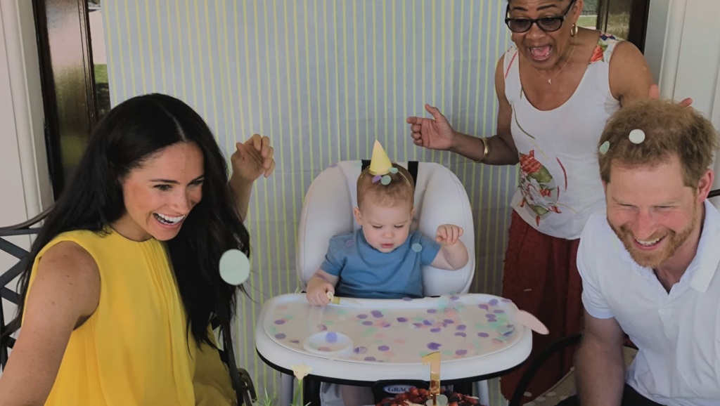 Harry, Meghan, and Meghan's mother Doria Ragland in a clip from son Archie's first birthday in 2020.