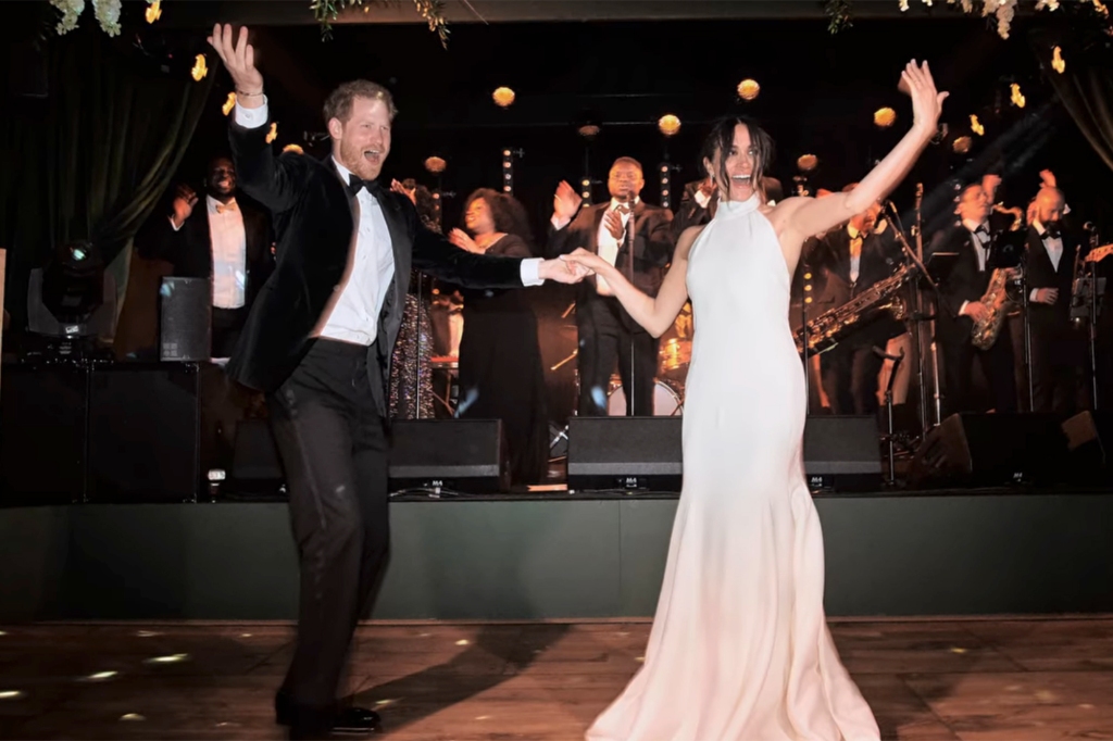 Harry and Meghan in "Harry & Meghan" holding hands on a dance floor. 