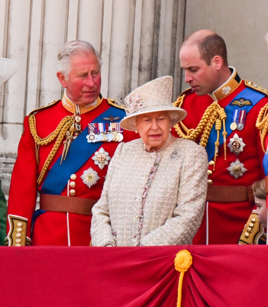 The Queen with Charles and William in uniform 