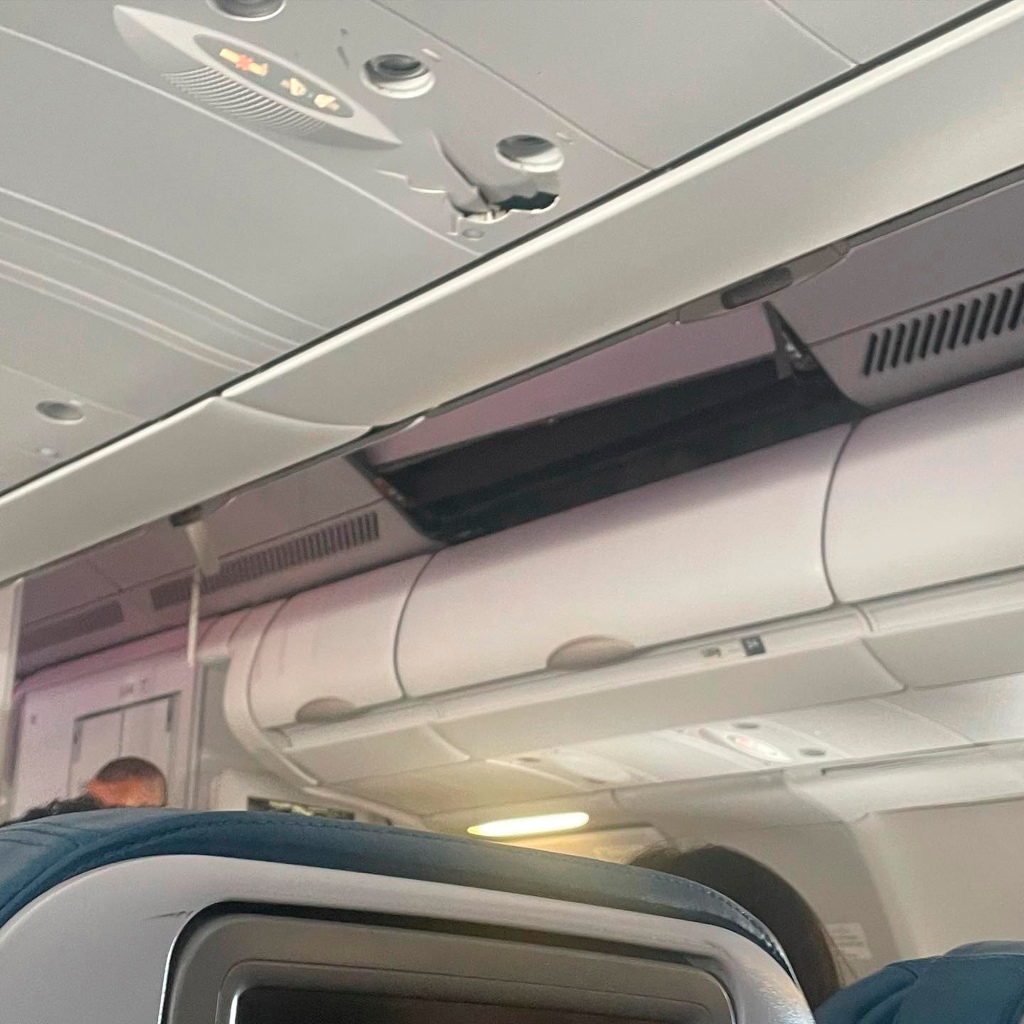 Cracks are seen in the plane's plastic panels following Sunday's incident that left 36 people injured. 