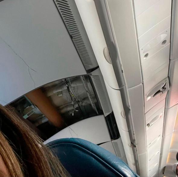 This mobile photo courtesy of passenger Jazmin Bitanga shows the interior of a Hawaiian Airlines plane on its flight from Phoenix to Honolulu, Sunday.