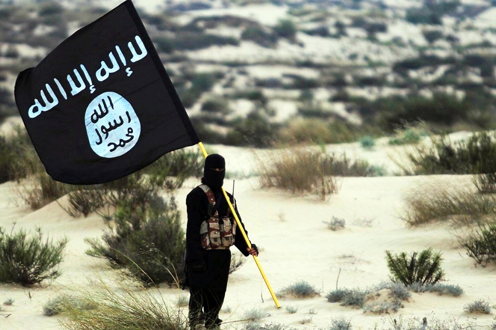 ISIS soldier with flag.