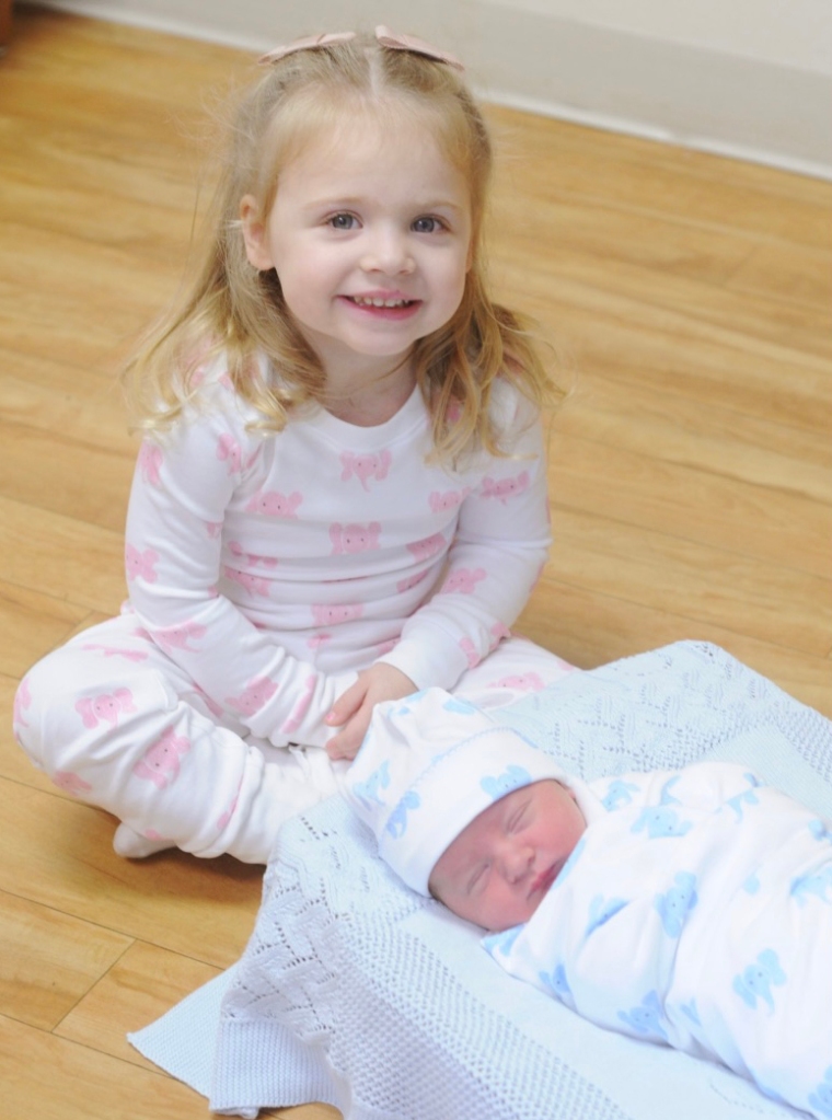 The newborn is Kayleigh McEnany's second child as big sister Blake poses next to Nash.