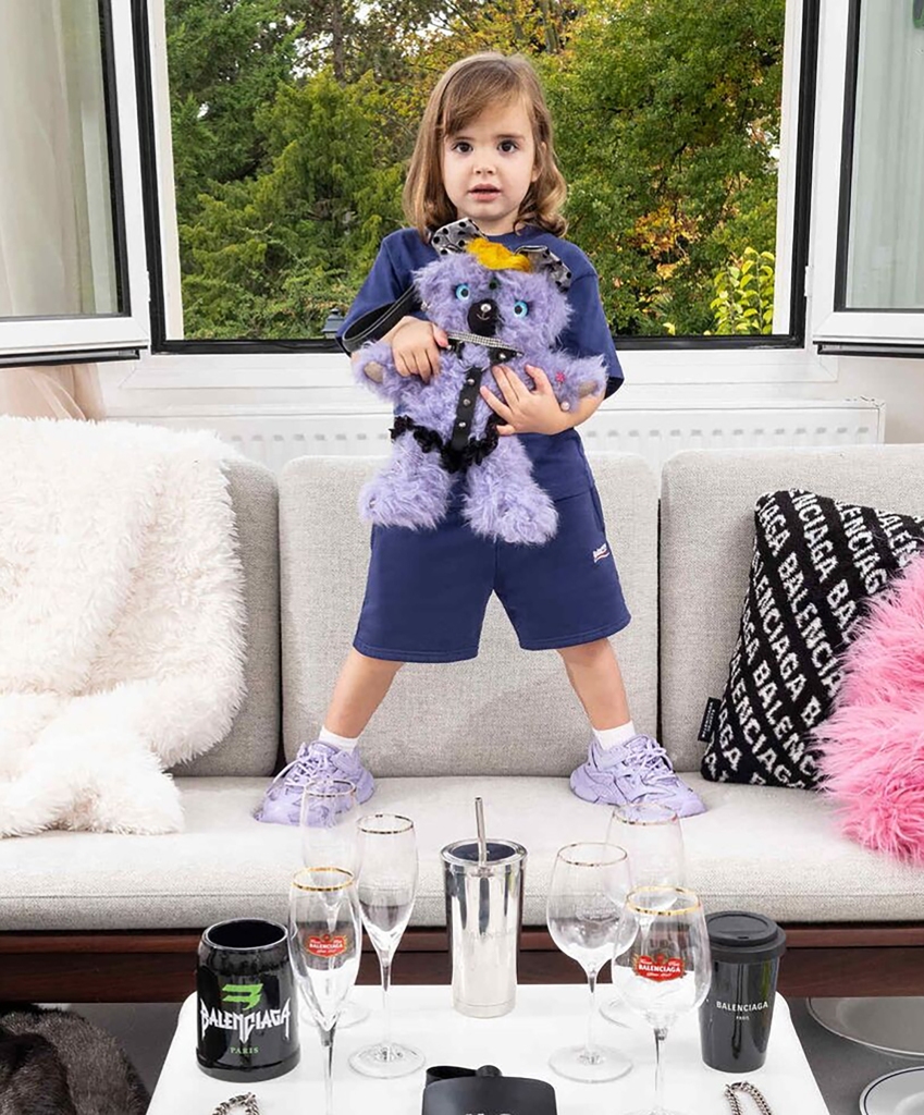 Balenciaga has apologized for a photo shoot featuring young children holding dolls that are outfitted with BDSM garb.