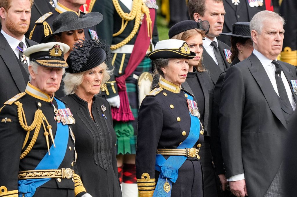 Britain's King Charles III , Camilla, the Queen Consort, Princess Anne, and Prince Andrew, from left, standing together during the state funeral service of Queen Elizabeth II in central London, England