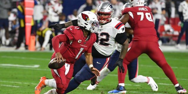 Kyler Murray #1 of the Arizona Cardinals scrambles with the ball against the New England Patriots during the first quarter of the game at State Farm Stadium on December 12, 2022 in Glendale, Arizona.