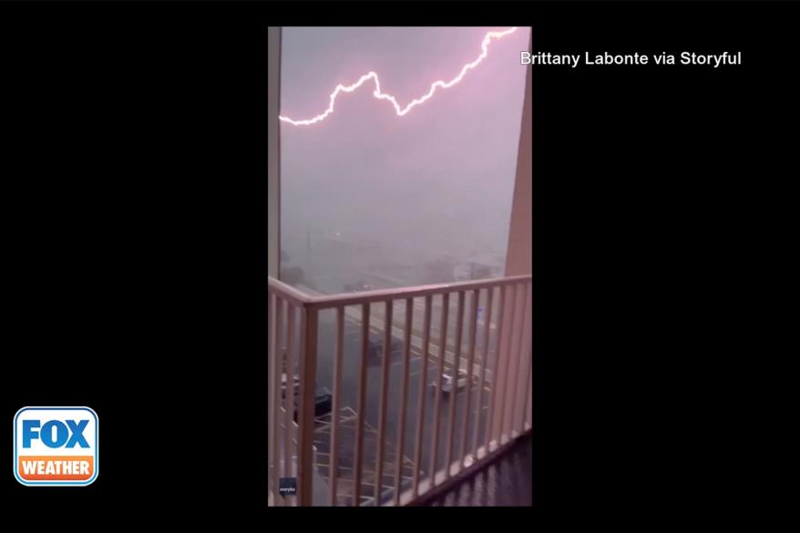 The woman was trying to take a video from the inside of a storm.