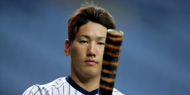 Outfielder Masataka Yoshida #34 of Japan warms up prior to the game two between Japan and Mexico at Kyocera Dome Osaka on March 10, 2019 in Osaka, Japan.