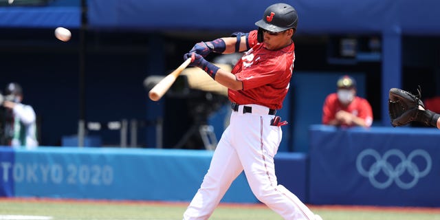 Masataka Yoshida #34 of Team Japan flies out to left field in the first inning against Team Mexico during the baseball opening round Group A game on day eight of the Tokyo 2020 Olympic Games at Yokohama Baseball Stadium on July 31, 2021 in Yokohama, Kanagawa, Japan.