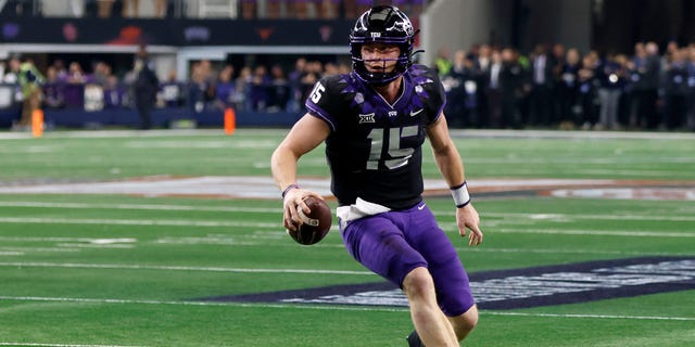 Max Duggan of the TCU Horned Frogs carries the ball against the Kansas State Wildcats in the second half of the Big 12 Football Championship on December 3, 2022, in Arlington, Texas.