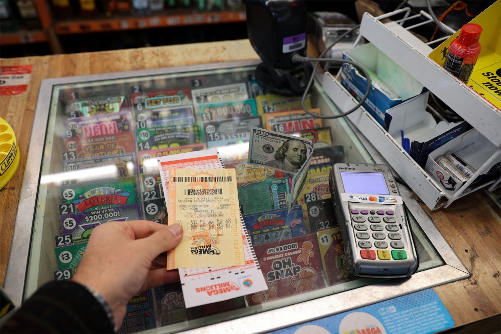 A person plays Mega Millions lottery at a store in Burlingame, California, United States on December 23, 2022. Today's Mega Millions jackpot hits $510 million.