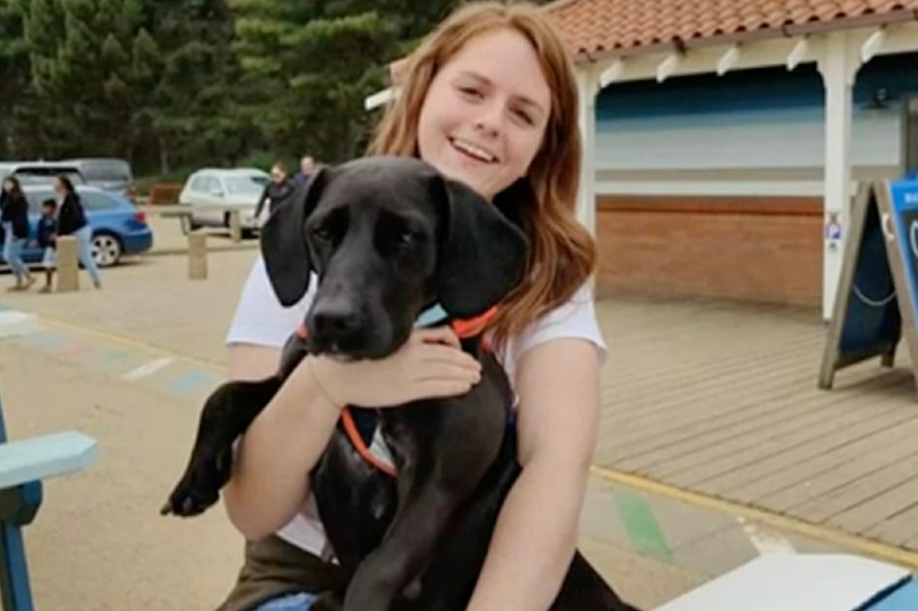 Madison Miller holding her dog, Bluebell.