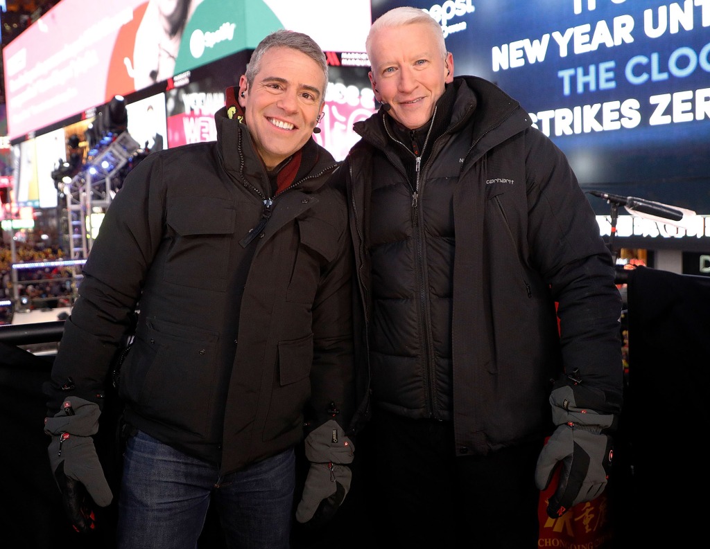 Andy Cohen (left) and Anderson (right) will return to host CNN's New Year's eve party. 