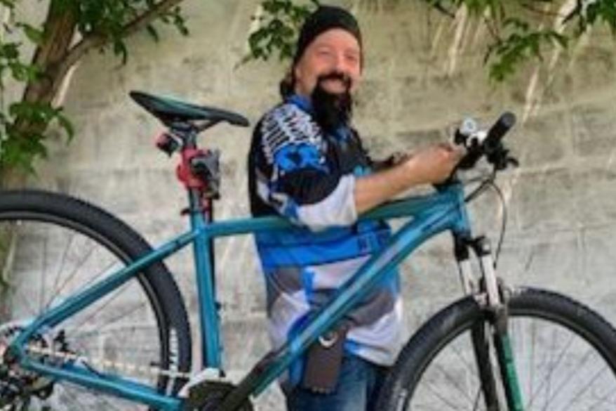 Pringle, born and raised in Marquette, Michigan, started his own bike company called "Build a Bicycle — Bike Therapy" in Kingsford, MI., after he had an epiphany one day.