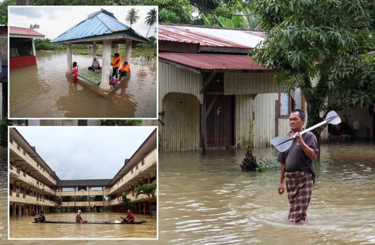 Malaysia floods force more than 70,000 to evacuate