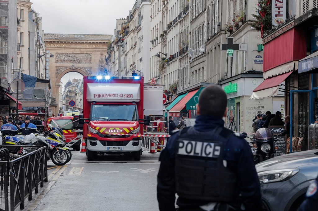 Emergency responders arrive in the area following the shooting.