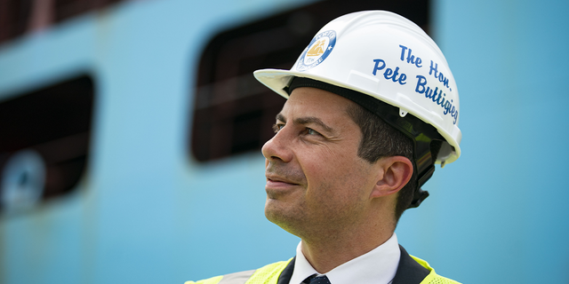 Secretary of Transportation Pete Buttigieg takes a tour of the Seagirt Marine Terminal at the Port of Baltimore on July 29, 2021.