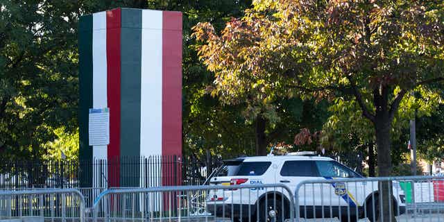 The plywood box that covers a statue of Christopher Columbus in Philadelphia has been painted the colors of the Italian flag, as seen in the photo above taken on Oct. 7, 2022.