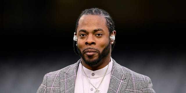 Former NFL player and Thursday Night Football broadcaster Richard Sherman before a game between the Chicago Bears and the Washington Commanders at Soldier Field in Chicago Oct. 13, 2022.