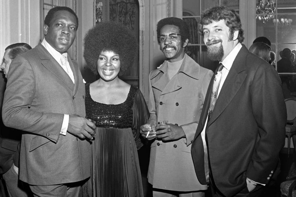 King Curtis with singer Roberta Flack and guests at an Atlantic Records party in her honor at the St. Regis Hotel in November 1969. 