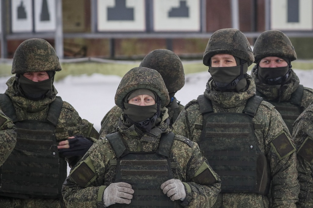 Mobilized servicemen attend a combat training.