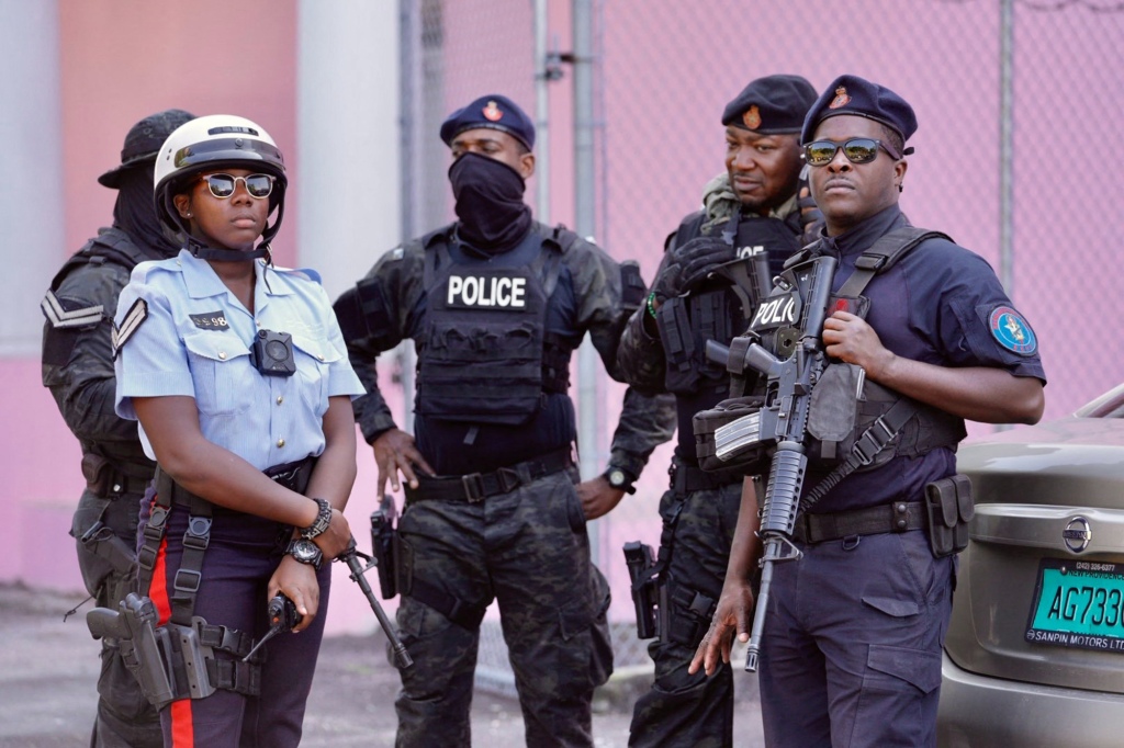 A picture of armed police officers as Sam Bankman-Fried arrived in court in The Bahamas.