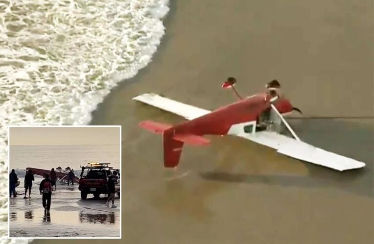 Small plane crash lands upside down on Santa Monica shoreline