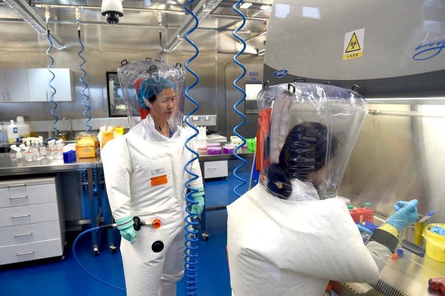 Virologists work in the P4 lab of the Wuhan Institute of Virology in Wuhan, China.