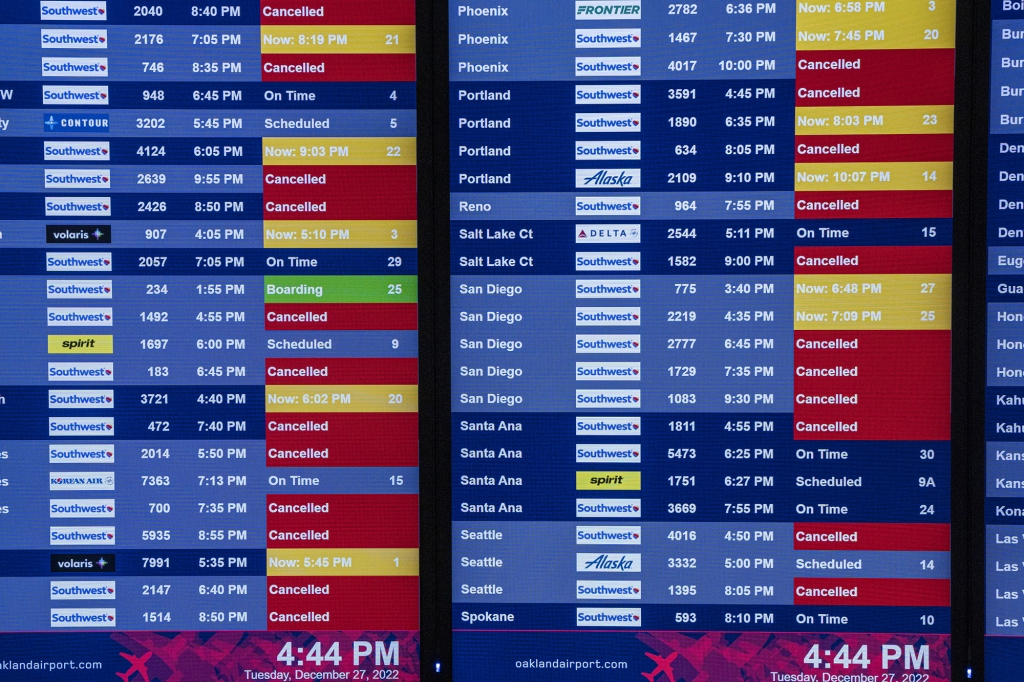 Flight display board shows endless Southwest flights canceled.