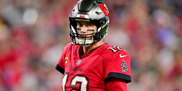 Tom Brady #12 of the Tampa Bay Buccaneers looks on against the New Orleans Saints during the first quarter in the game at Raymond James Stadium on December 05, 2022 in Tampa, Florida.