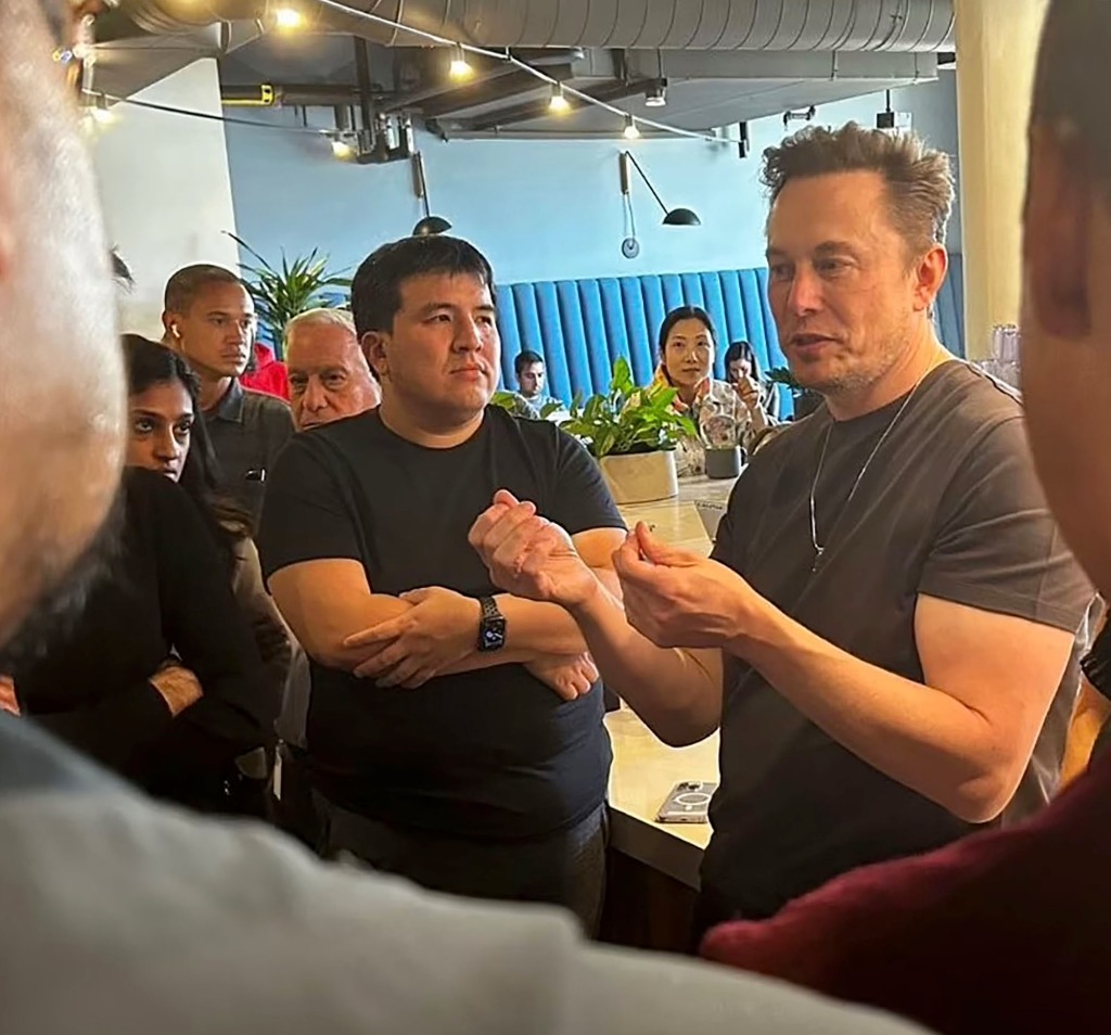 Elon Musk at Twitter headquarters coffee bar speaking to Twitter employees.